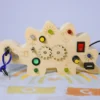 Tortuga Sensorial - Dinosaur Busy Board