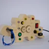 Tortuga Sensorial - Dinosaur Busy Board