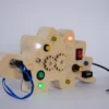 Tortuga Sensorial - Dinosaur Busy Board