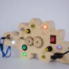 Tortuga Sensorial - Dinosaur Busy Board